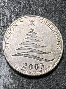 1 TROY OZ .999 FINE SILVER 2003 SEASONS GREETINGS ROUND