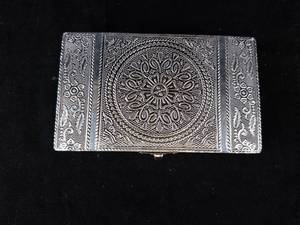 Ornate Embossed Metal Jewelry Box with Clasp - Circular Medallion Design