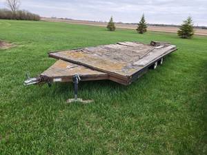 Flatbed Trailer with Dual Axles and Wood Deck approximately 20 feet long with dual axels - Wood Deck will need replacing