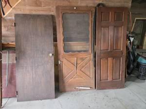 Assorted Wooden Doors Including Screen and Panel Doors