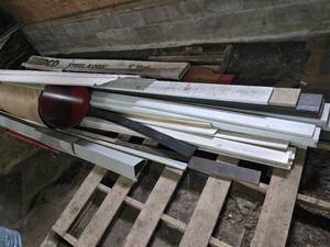 EDCO Steel Siding Pieces and Trim Pieces with Red Metal Roll
