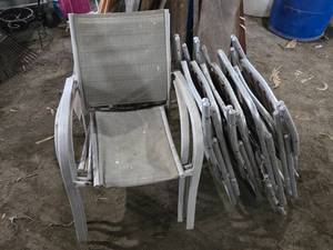 Used Patio Chairs Including Metal Frame and Mesh Design, Stackable Chairs, and Wood Slat Chairs