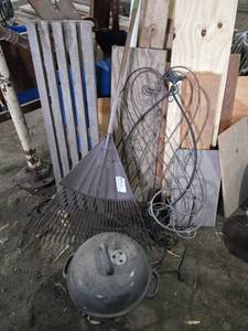 Rake, Charcoal Grill, and Decorative Metal Stand