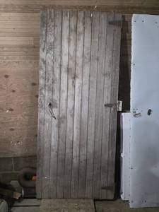 Rustic Wooden Door with Hinges and Latch
