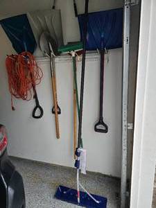 Garage Tool Lot with Shovels, Push Broom and Extension Cord