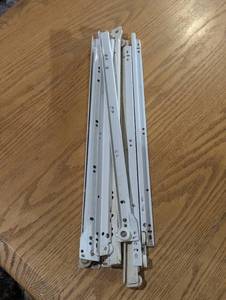 Pile of Cabinet Draw Sliders