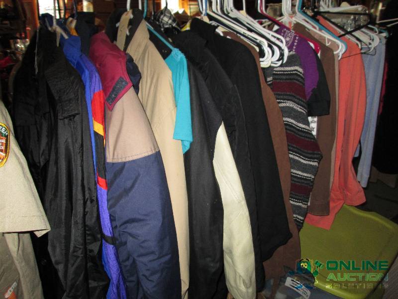 Lot of assorted clothing and hanger...