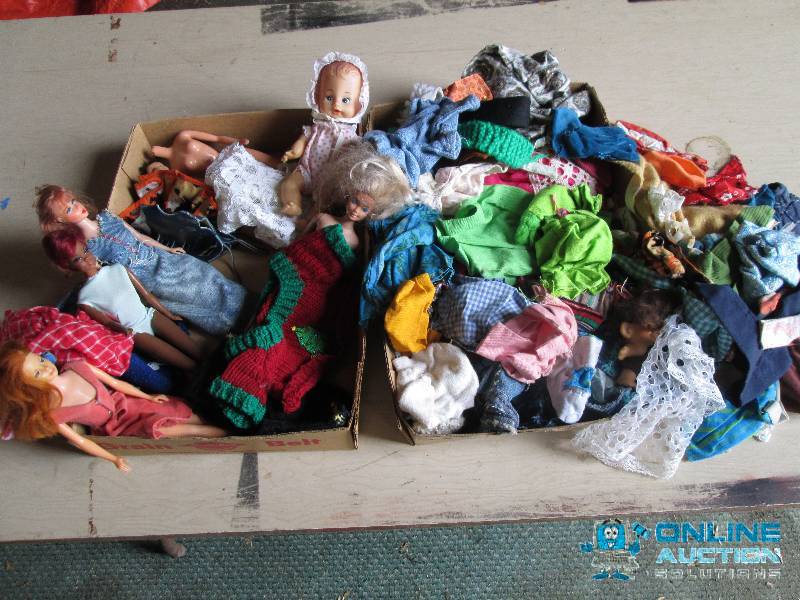 Assorted dolls and doll clothes...