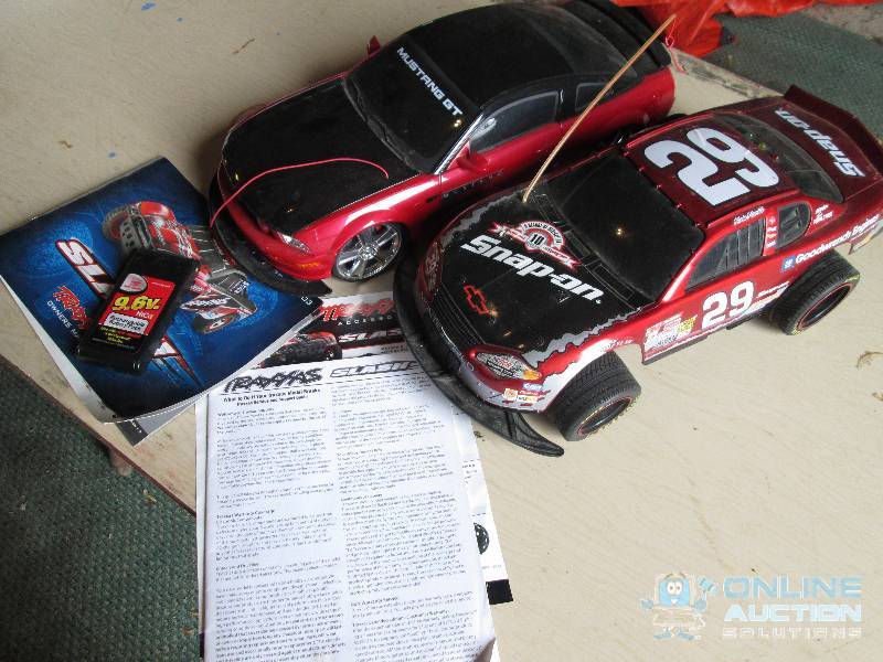 2 cars, one battery.  Radio control...