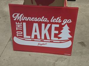 Metal Sign  Leinen Kugels Lets Go To The Lake logo