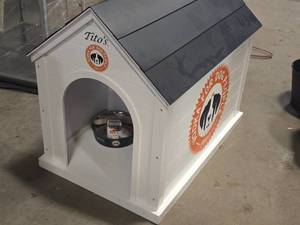 Wood Dog House  Titos logo