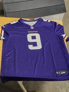 Jersey by NFL On Field Apparel  #9 JJ McCarthy Minnesota Vikings logo  Size Adult XL