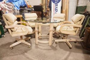 Glass-Topped Dining Room Table Set w4 upholstered chairs on casters
