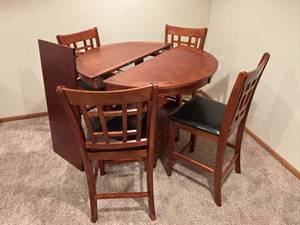 Cherry Finish Round Extension Dining Table with 4 Cushioned Chairs