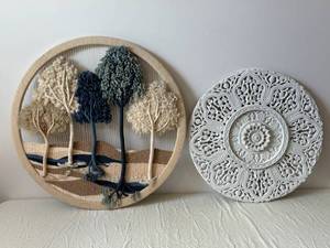 Handwoven Circular Yarn Wall Hanging with Pom-Pom Accents and Two Ornate Round Wall Plaques