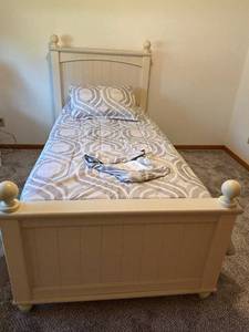 White Wood Twin Bed Frame with Turned Ball-Top Posts and Carved Headboard