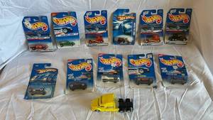 Hot Wheels Carded Die-Cast Lot - 1995 Model Series, 1998 First Editions Lakester, 1999 Space Series