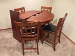 Cherry Finish Round Extension Dining Table with 4 Cushioned Chairs