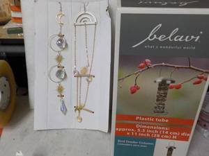 Hanging Sun Catchers and Bird Feede...