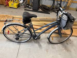 Infinity Cycleworks City Hybrid Bicycle with Schwinn Saddle Bag and Front Basket
