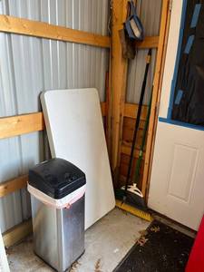 Lifetime Folding Table with Yard Tools - Garage Storage