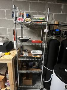 Vertical Metal Storage Rack w Contents Included Gun Digest Books & Pistol Signs & More Contents quantities unverified - 75 x 24
