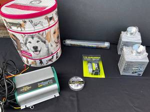 Cabelas ProMariner ProSport12 2-Bank Marine Battery Charger, Spinning Reel Spool Parts, EEL Lure & Eukanuba Dog Tin