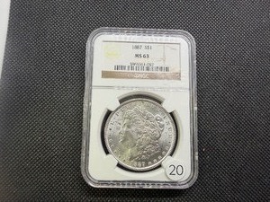 1887 Morgan Silver Dollar NGC MS63 - NGC Price Guide is $110