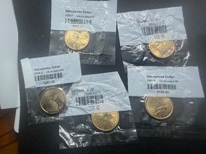 2002 P Sacagawea Dollar, Two 2003 P Sacagawea Dollars, 2003 D Sacagawea Dollar, 2004 D Sacagawea Dollar (5 Coins)