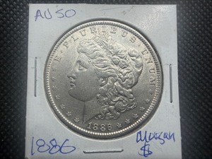 1886 Morgan Silver Dollar Marked AU When Purchased
