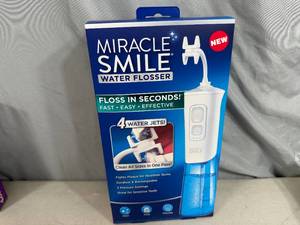 New Miracle Smile Water Flosser