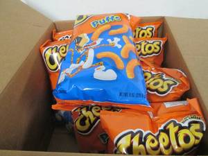 9 Eight ounce bags of Cheetos puffs...