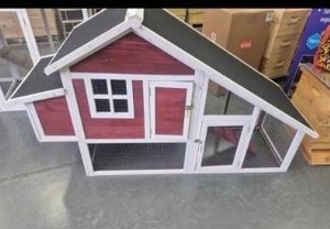 red chicken coop ready to assemble...
