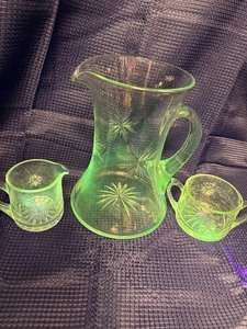 Atomic starburst pitcher and 2 glasses