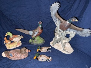 Lot of decorative birds, ducks, pheasants