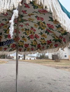 Vintage floral patio umbrella with tassels