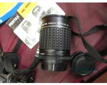 Pentax K1000 35 mm camera with lense, book, f...