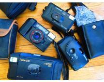 Lot of assorted Polaroid cameras and cases...