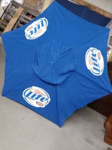 Miller Lite patio table umbrella with all wooden spokes