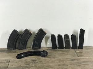 Lot of 9 Ammo Clips - 2 of them have Ammo in them