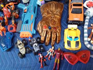 Box of toys including Tonka and Fisher Price