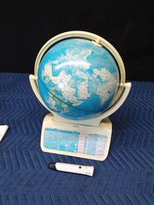 Battery operated Oregon Scientific Smart Globe with stylist