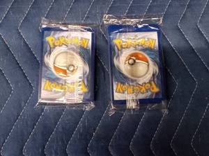 2 Unopened packs of Pokmon trading cards