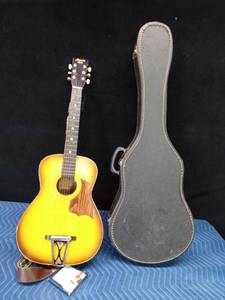 Vintage Harmony Stella guitar with case and extra strings