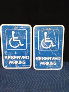 2 Metal Reserved parking handicap signs