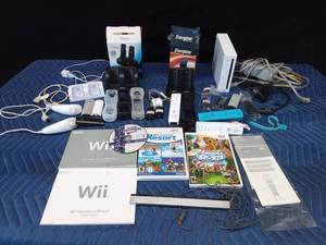 WII game with3 games, instructions, cords and naby accessories