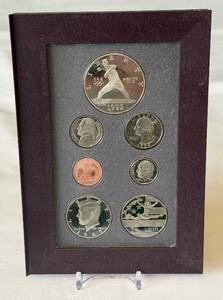 1992-S US Mint Prestige 7 Coin Proof Set - Olympics - Nolan Ryan Silver Dollar  Coins and Case only, fire damage evident