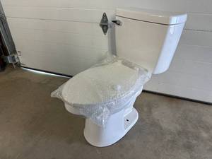 New Aquasource Elongated Bowl Toilet