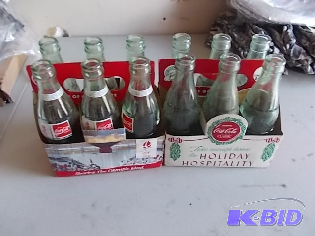 lot 32 image: Coca-Cola Collectible 6-Packs