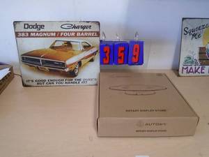 Dodge charger sign & new diecast turntable. As shown. CASH ON SITE ONLY. PICKUP IS MONDAY MAY 11TH FROM 11 AM TO 4 PM. REGARDLESS WHAT THE SCHEDULE STATES.